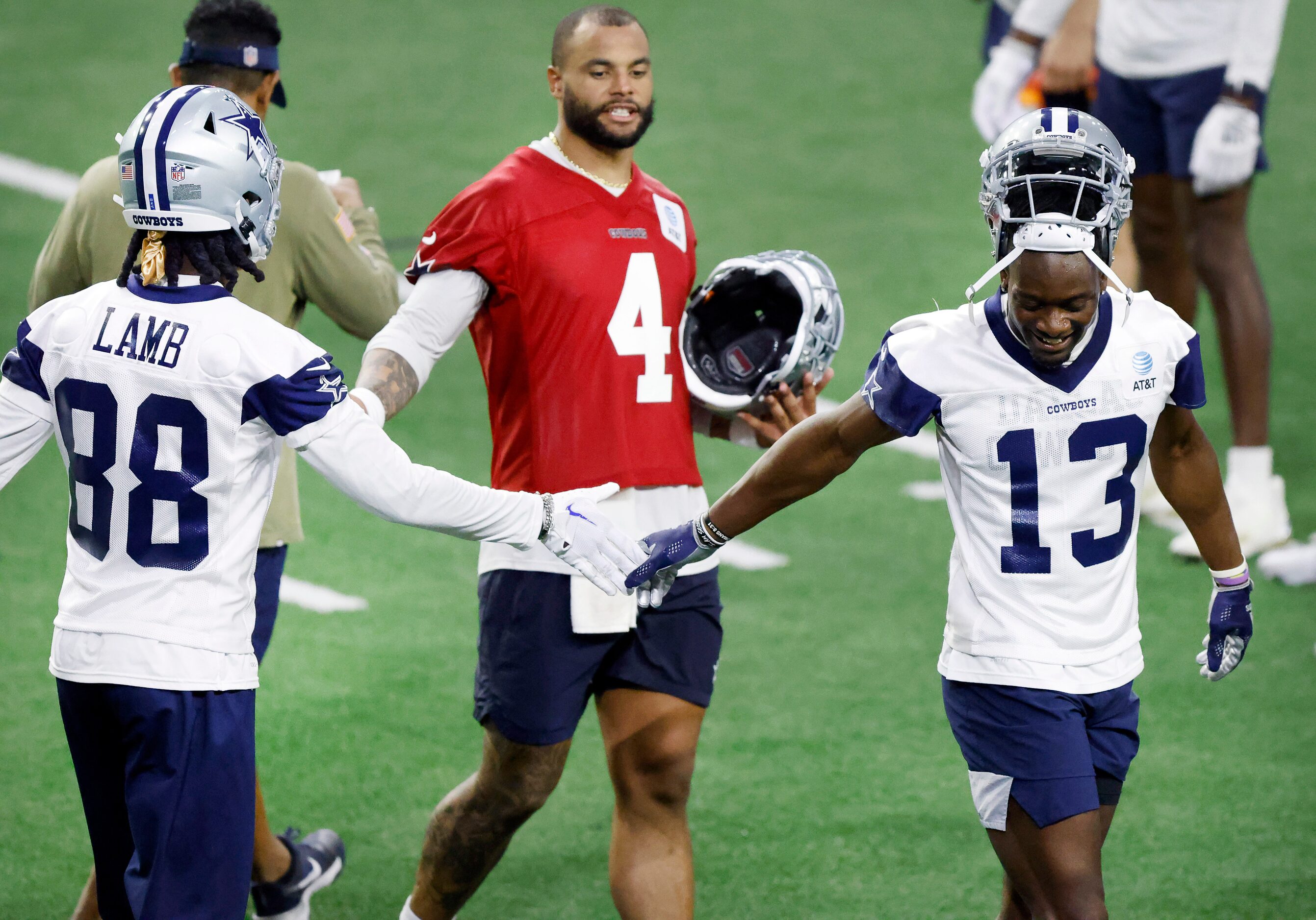 Dallas Cowboys wide receiver CeeDee Lamb (88), quarterback Dak Prescott (4) and wide...