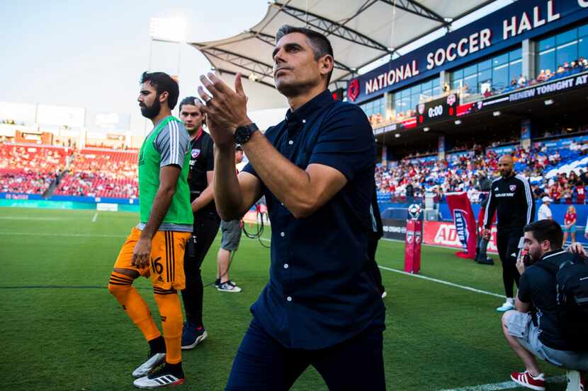 FC Dallas coach Luchi Gonzalez enters the field before an MLS game between FC Dallas and...