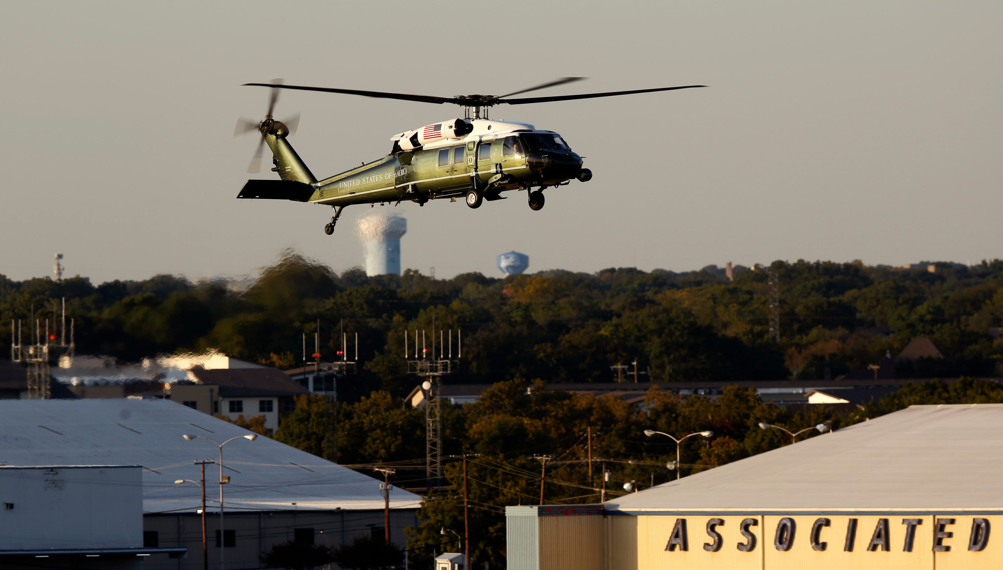 President Trump arrives at Love Field in Dallas aboard Marine One after visiting a new...