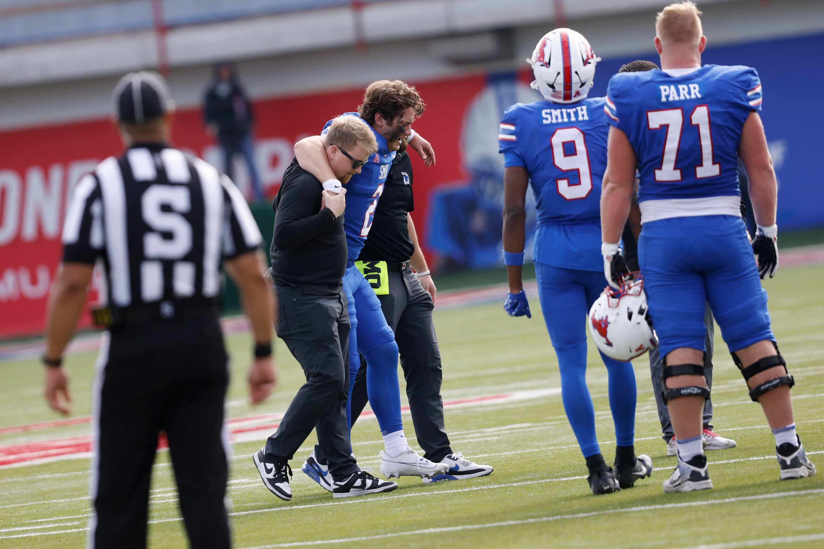 SMU quarterback Preston Stone (2) leaves the field after he injured during the first half of...