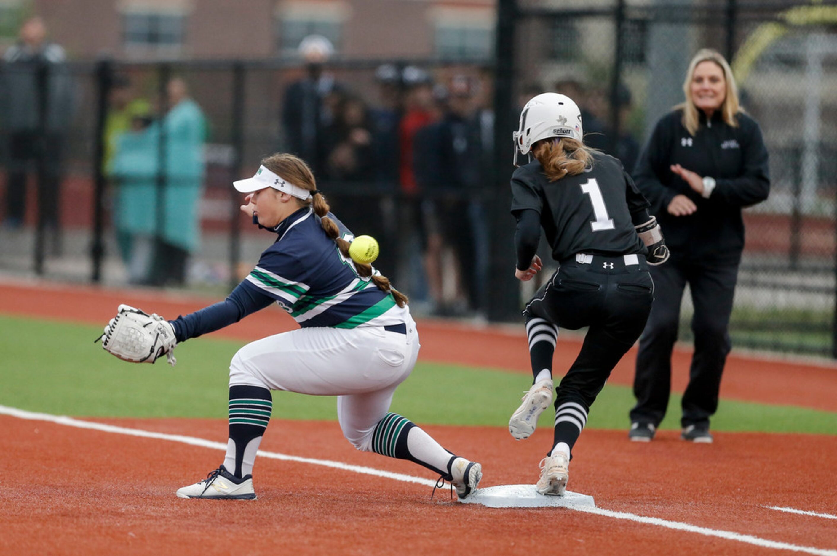 EatonÃs first baseman Kenzlee Zaher is unable to make the catch as Denton GuyerÃs Morgan...