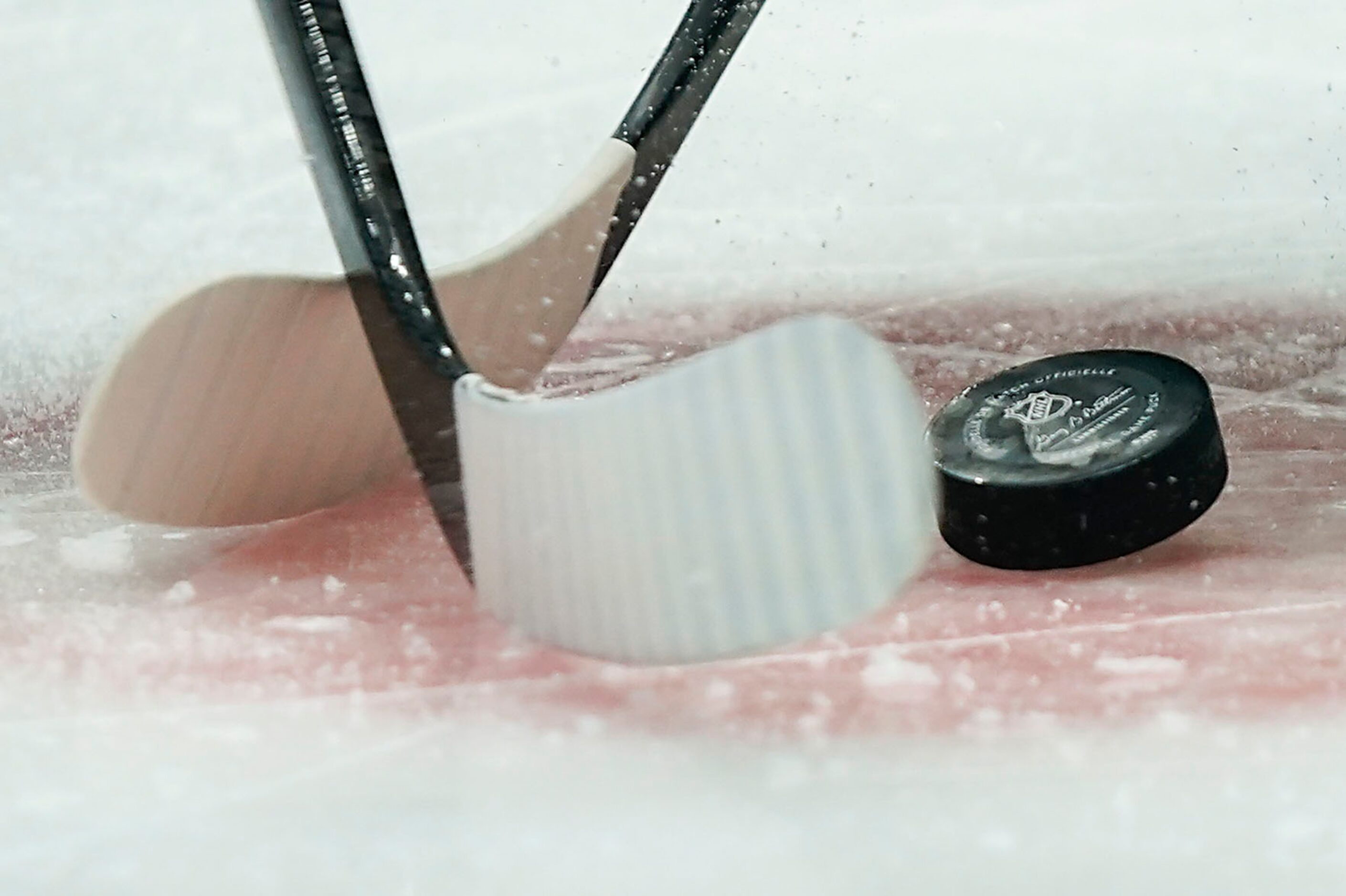 The puck drops for a face off between the Dallas Stars and the Tampa Bay Lightning during...