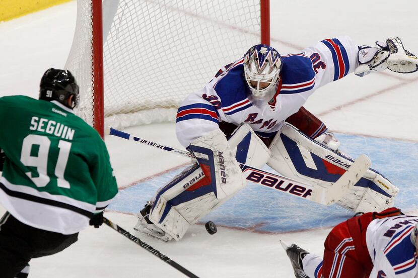 New York Rangers goalie Henrik Lundqvist (30) makes the save on a shot from Dallas Stars...