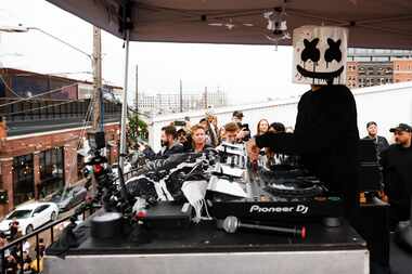 Music producer and DJ Marshmello, performs during a surprise pop up show on Friday, April...