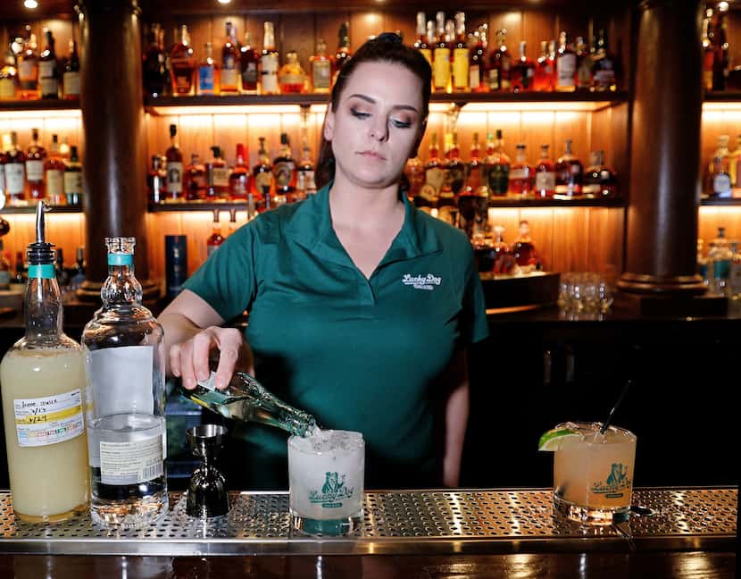 Kristen Dollar, bar manager at sibling restaurant Katy Trail Ice House, makes a Texas Ranch...