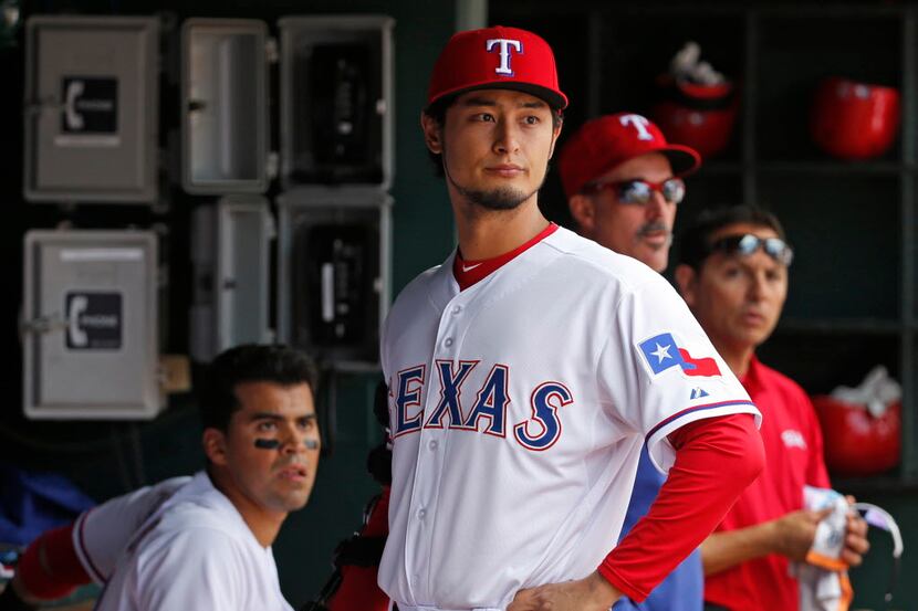 Texas Rangers starting pitcher Yu Darvish (11) is pictured in the dugout during the Houston...