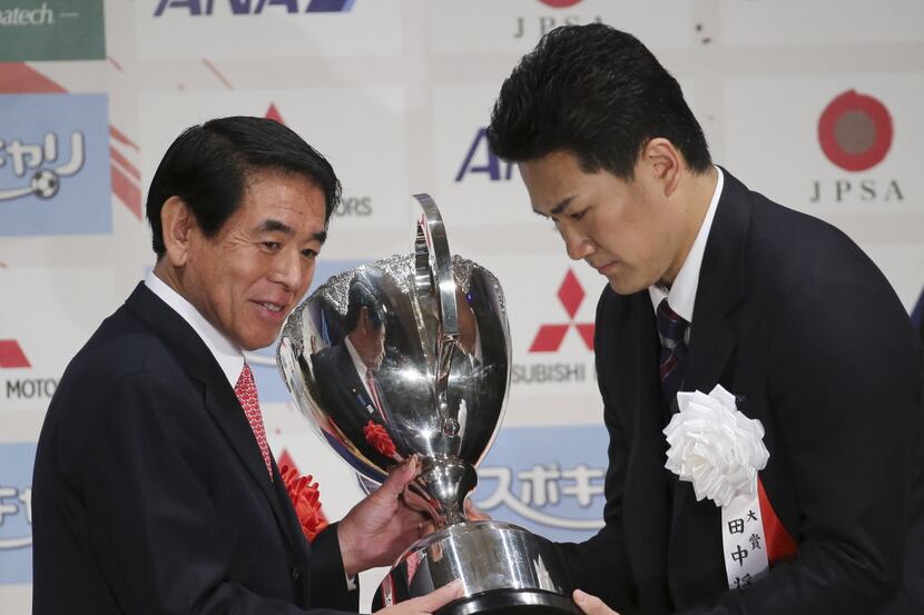 Masahiro Tanaka, right, star pitcher of Japanese baseball club Rakuten Golden Eagles...