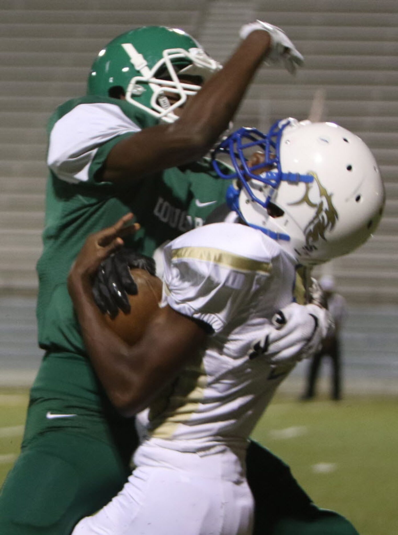 Conrad receiver Martin Harding (10) is met by Bryan Adams defensive back Nick Murphy (9)...