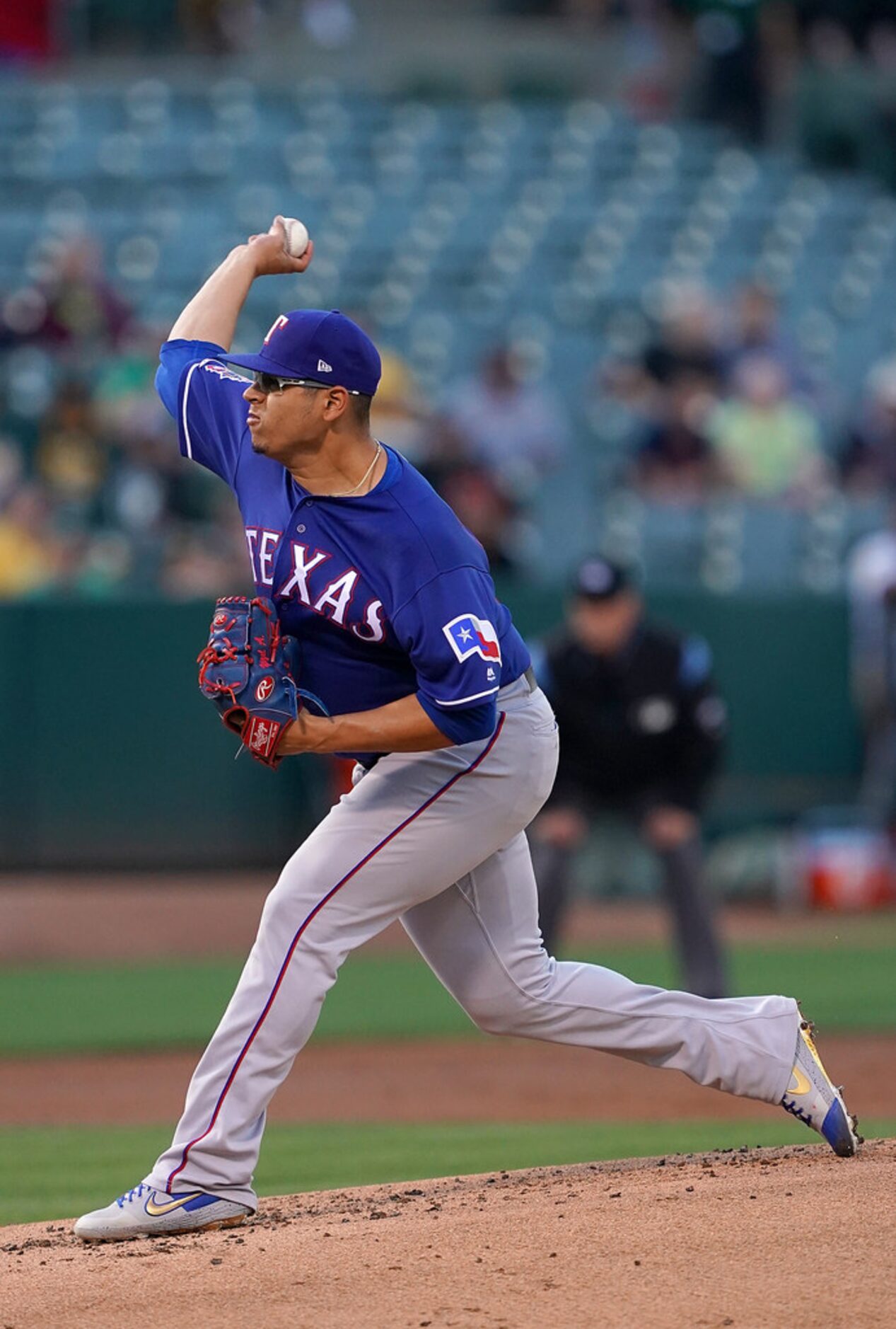 OAKLAND, CA - JULY 25:  Ariel Jurado #57 of the Texas Rangers pitches against the Oakland...