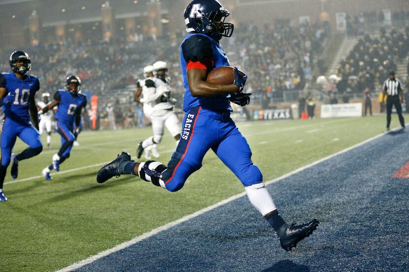Allen running back Celdon Manning (1) strolls into the end zone for the first touchdown...