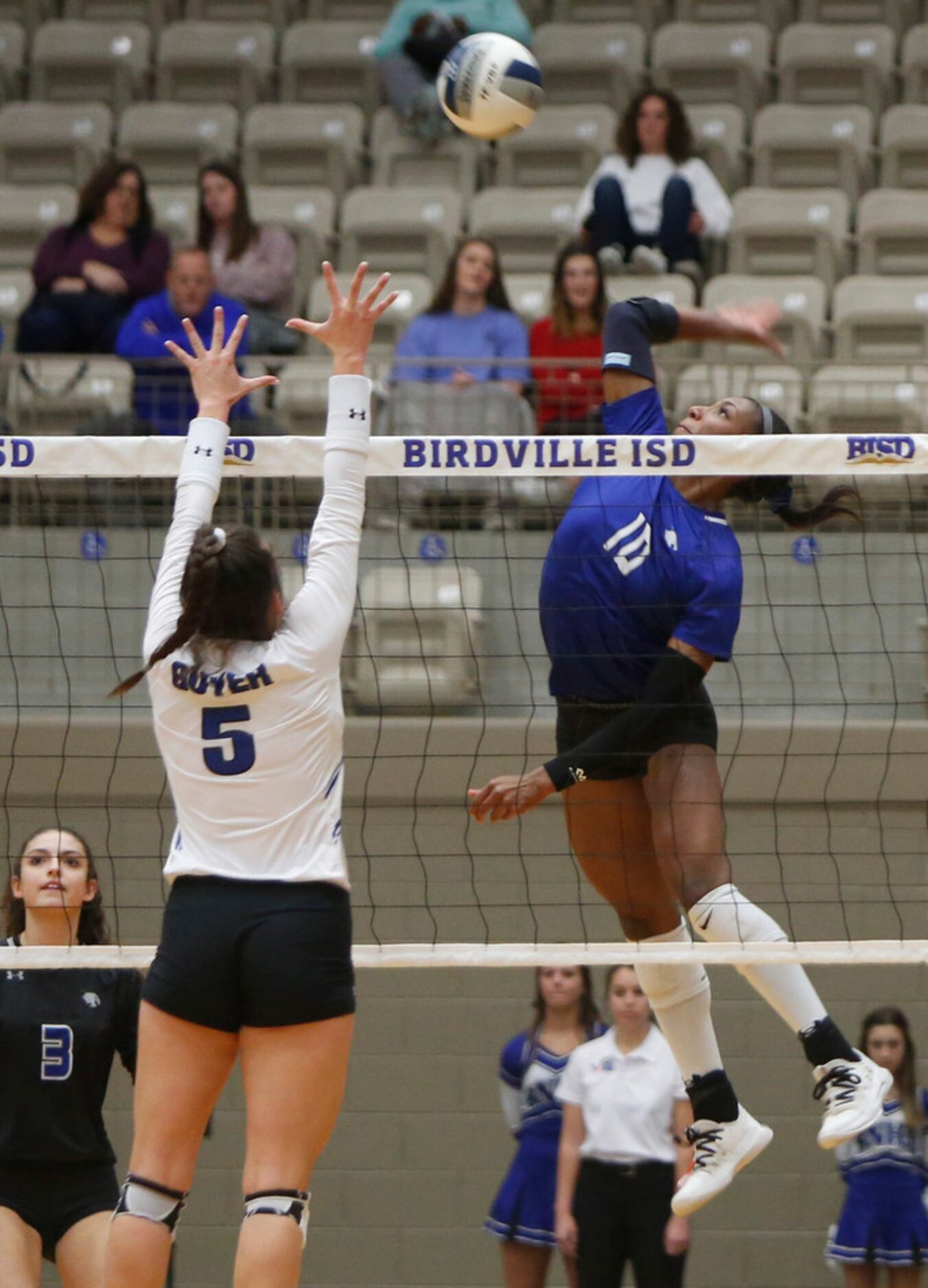 Trophy Club Byron Nelson outside hitter Charitie Luper (10) skies to launch a shot against...