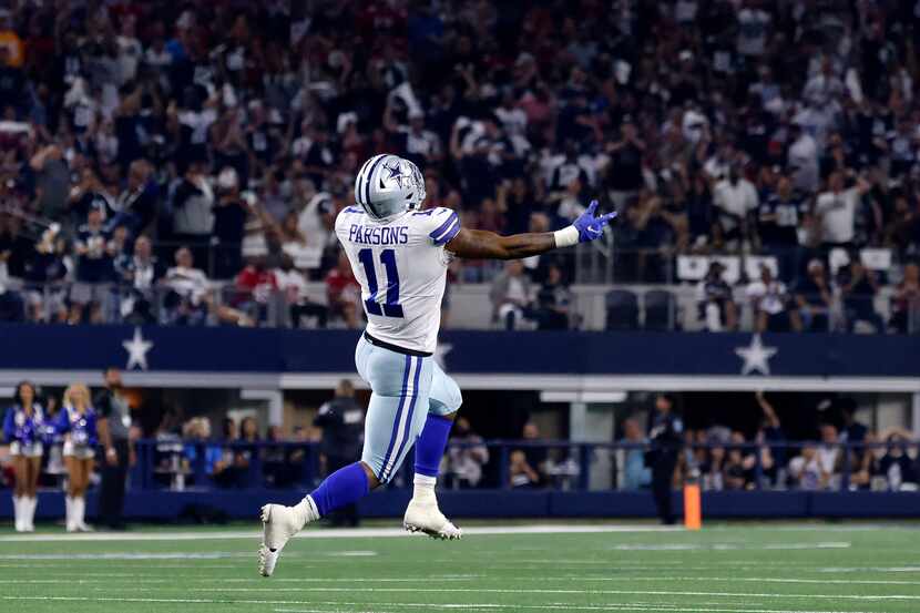 Dallas Cowboys linebacker Micah Parsons (11) celebrates after sacking Tampa Bay Buccaneers...