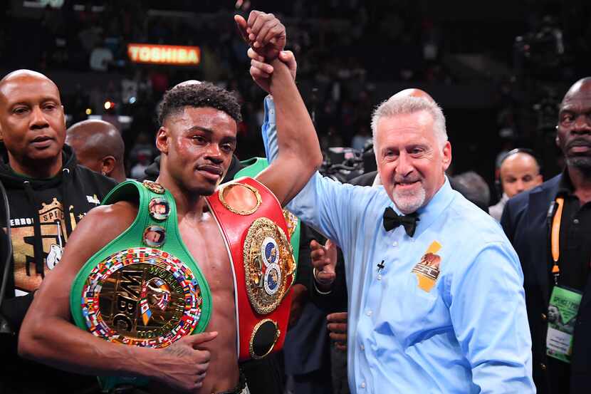 LOS ANGELES, CA - SEPTEMBER 28: Referee Jack Reiss in in the ring with Erroll Spence Jr....