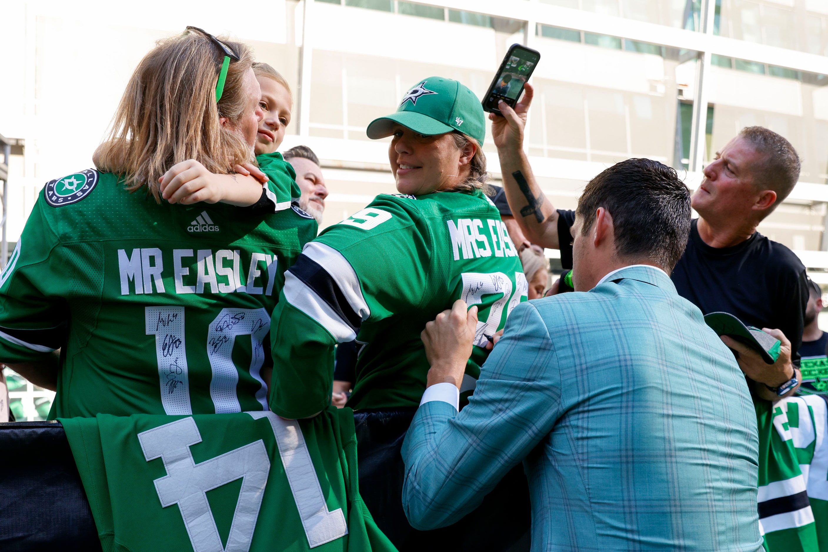 Dallas Stars left wing Mason Marchment gives autograph to a fan during the team’s home...