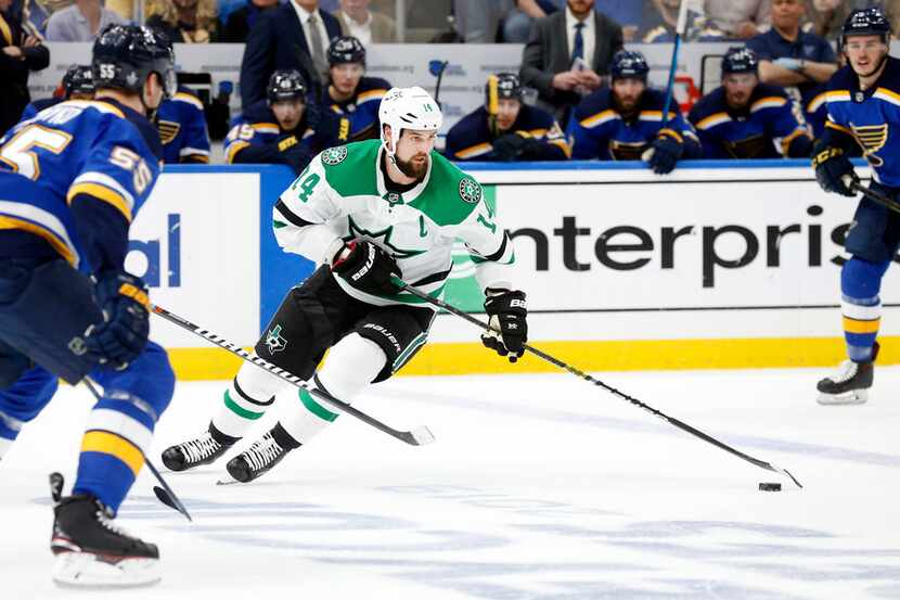 FILE - Dallas Stars left wing Jamie Benn (14) controls the puck against the St. Louis Blues...