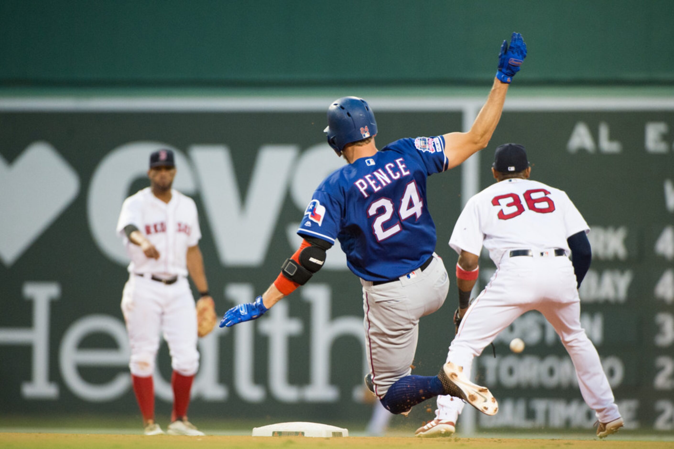 BOSTON, MA - JUNE 10: Hunter Pence #24 of the Texas Rangers safely slides into second base...