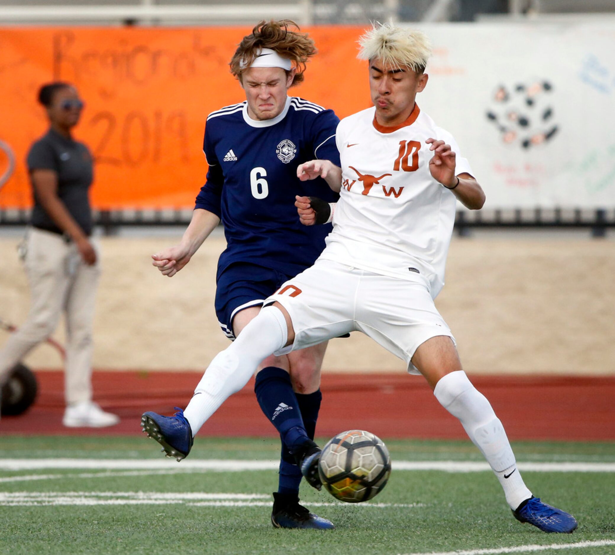 Flower Mound's Peyton Weeter (6) and W.T. White's Byron Aguilar (10) battle for the ball...