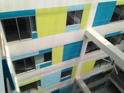  The inside of the 6-story atrium has been painted bright colors. (Steve Brown)