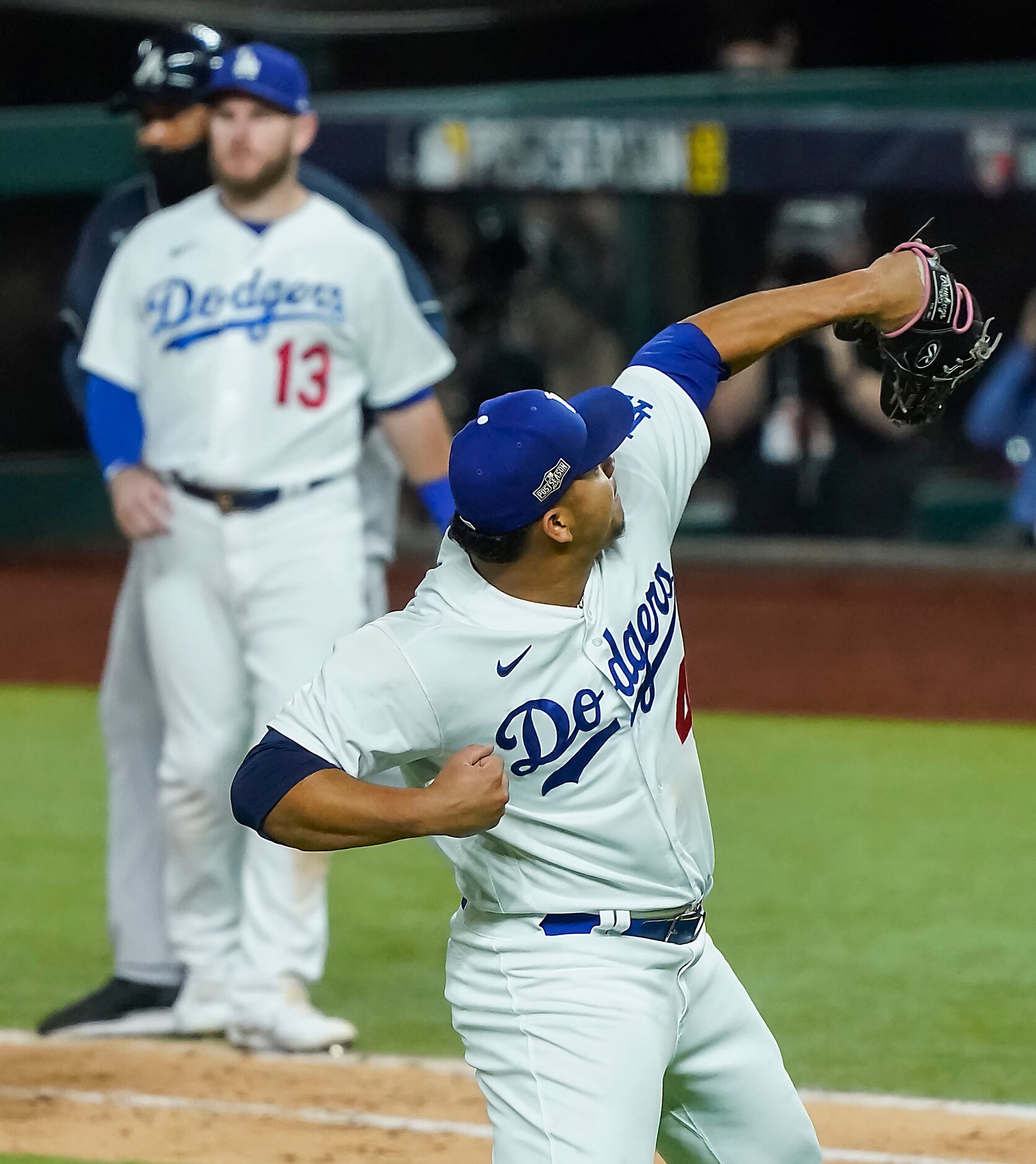 Los Angeles Dodgers pitcher Brusdar Graterol celebrates after striking out Atlanta Braves...