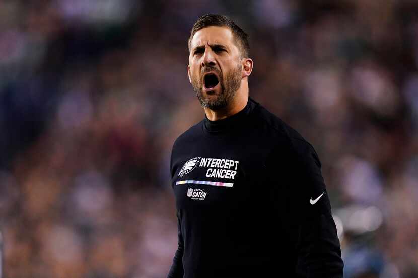 Philadelphia Eagles' Nick Sirianni shouts during the first half of an NFL football game...