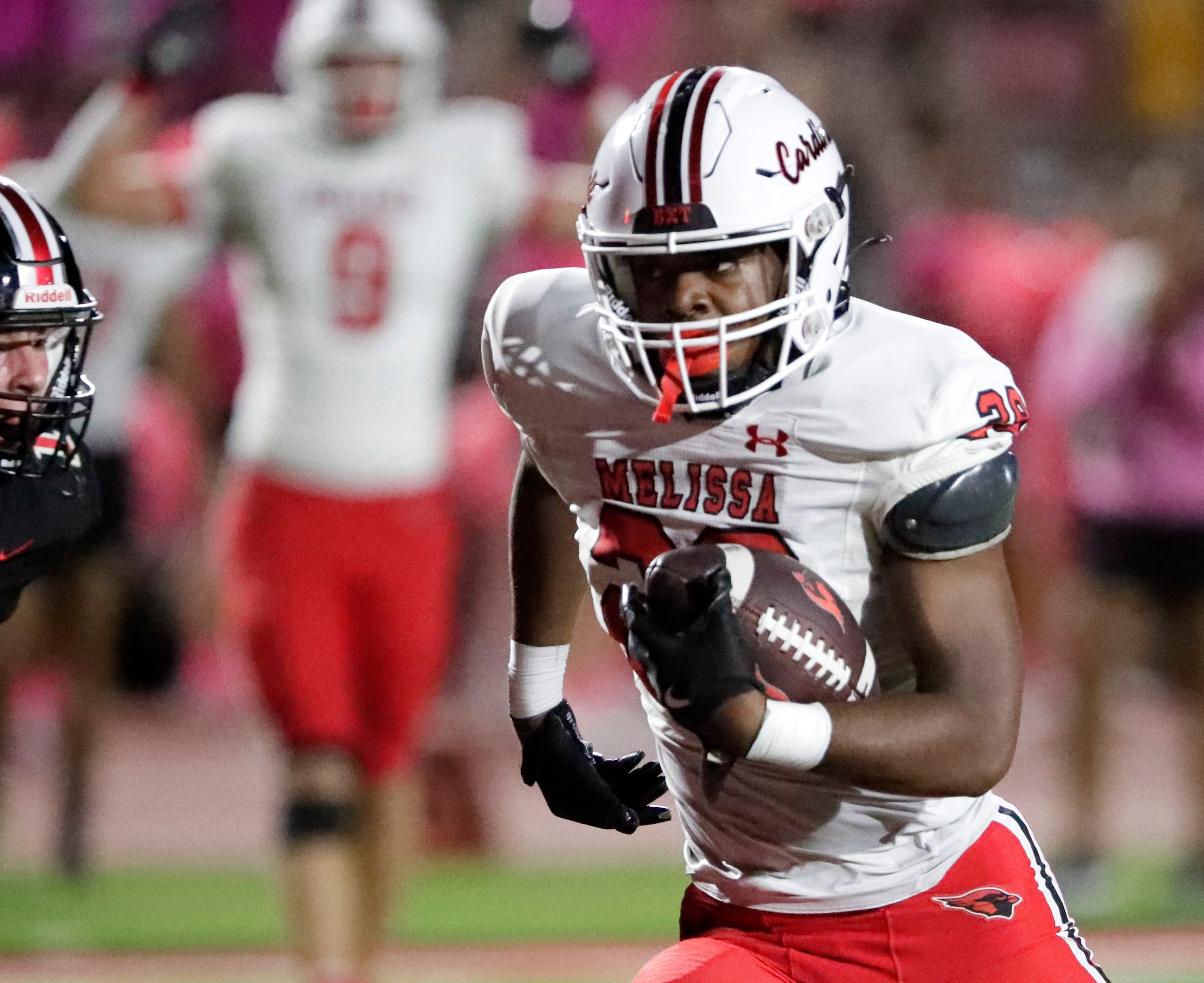 Melissa High School running back Zayd Shaheed (28) scores a touchdown on this run during the...