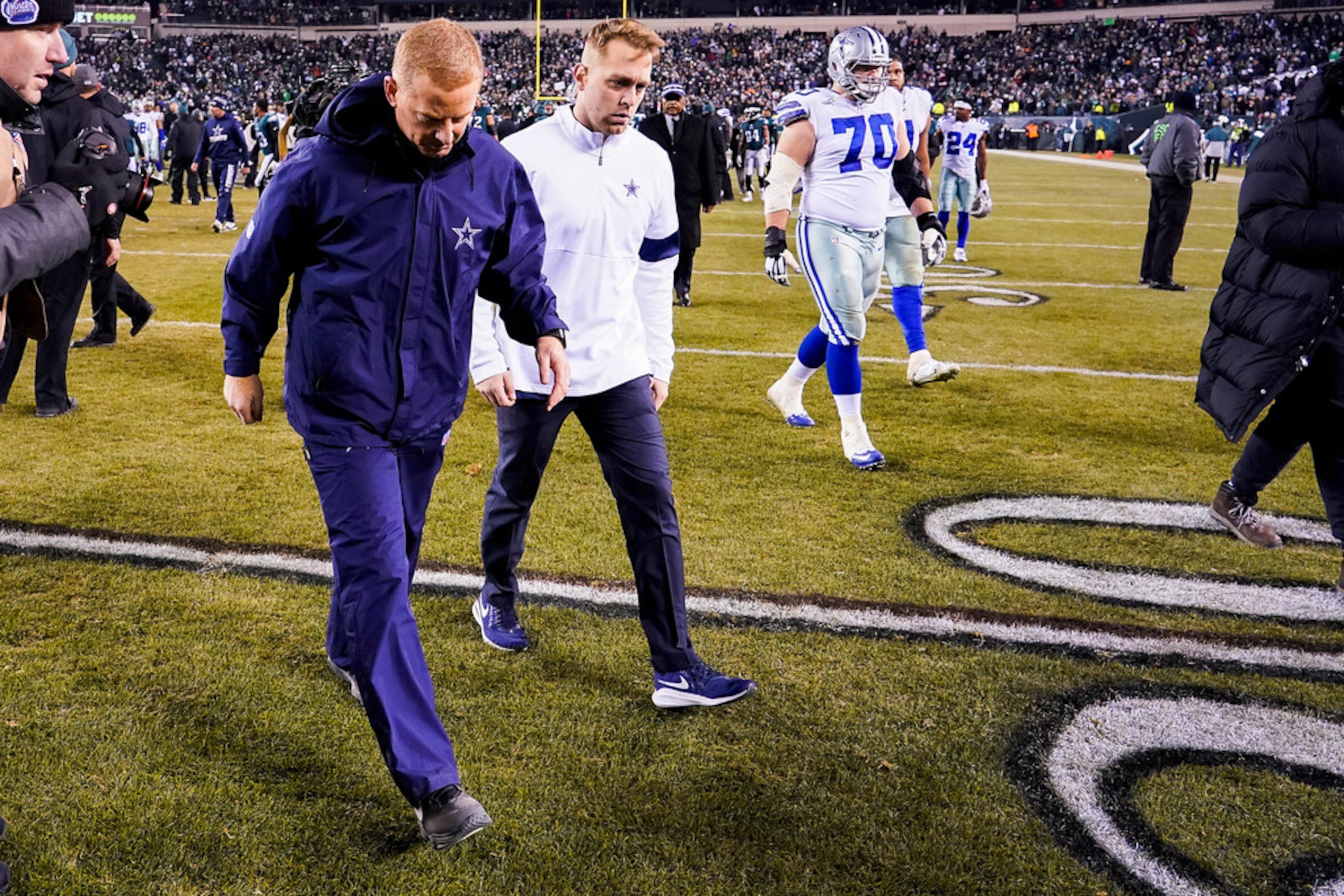 Dallas Cowboys head coach Jason Garrett walks off the field after a loss to the Philadelphia...