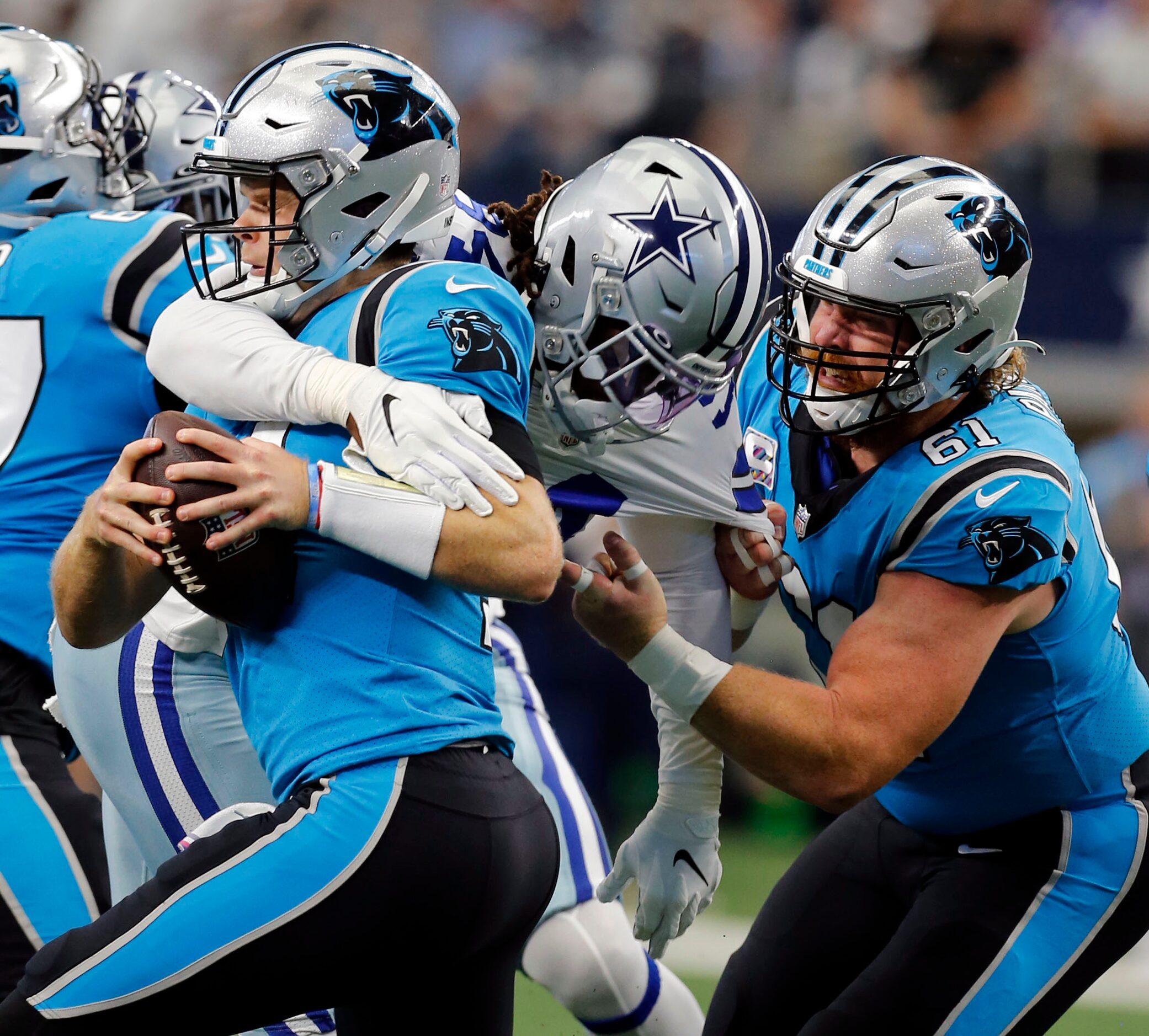 Dallas Cowboys defensive end Randy Gregory (94) blows past Carolina Panthers center Matt...