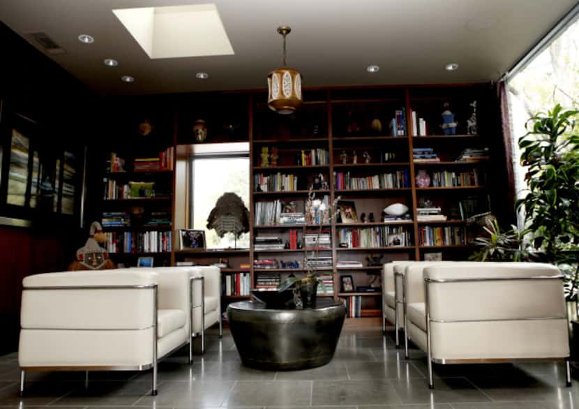 The library at the home of D'Andra Simmons and Jeremy Lock in Dallas. The contemporary home...