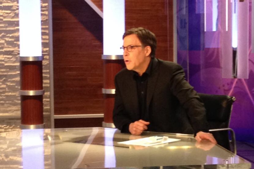 In a photo provided by NBC Olympics, NBC's Bob Costas prepares for broadcast at an anchor...