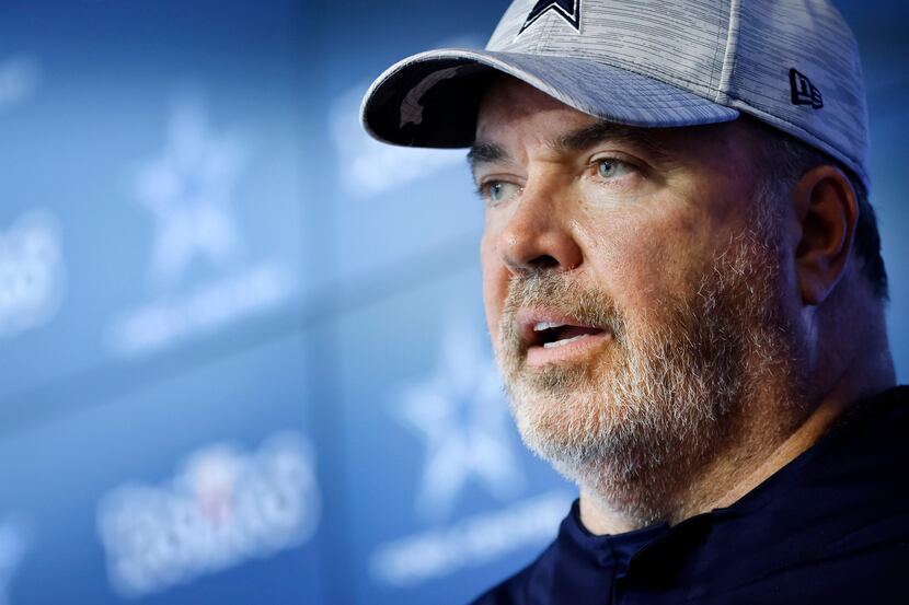 Dallas Cowboys head coach Mike McCarthy responds to reporters questions following practice...