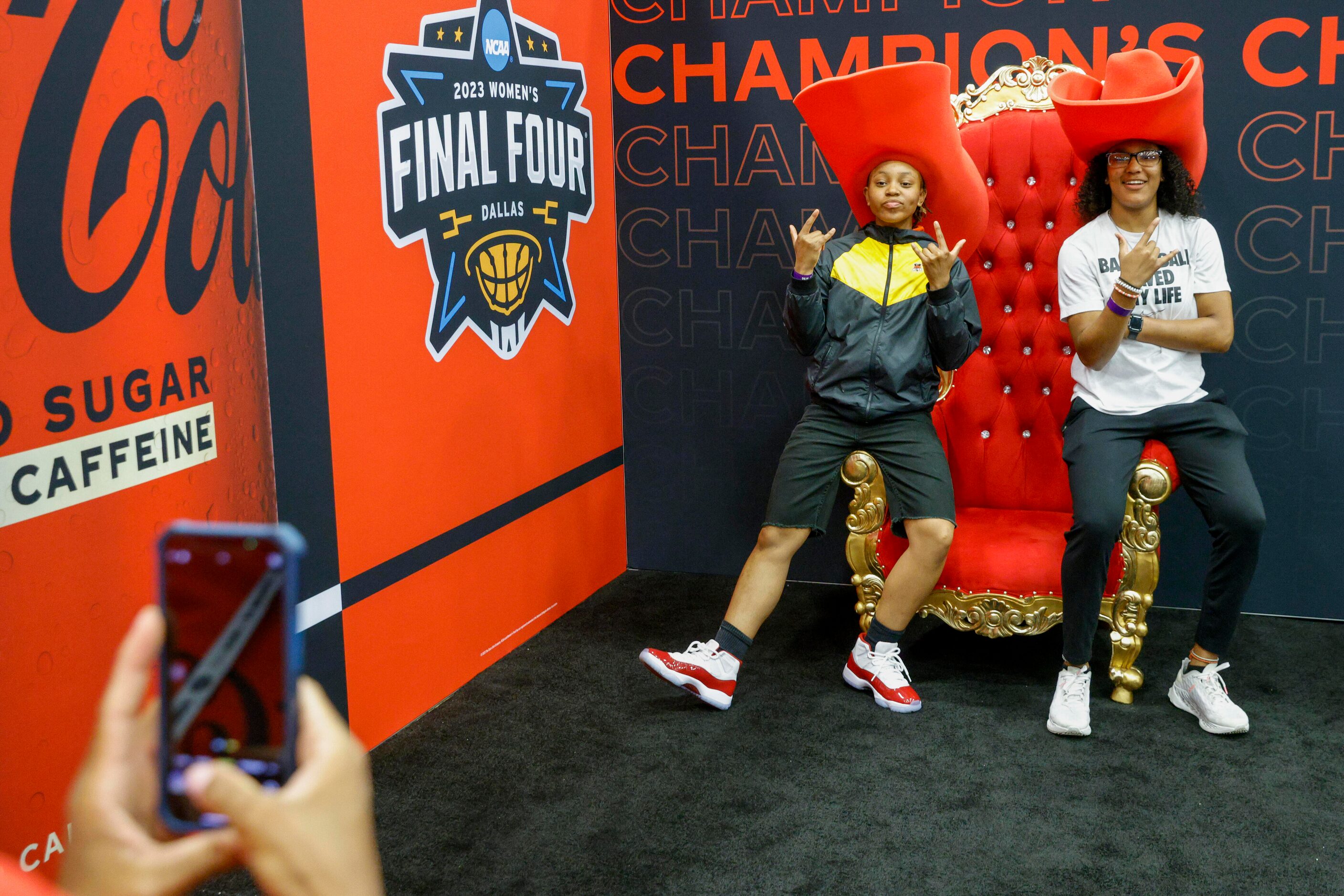 Zakiya Stephenson, 17 (left), and Stailee Heard, 18, pose for a photo during the NCAA...