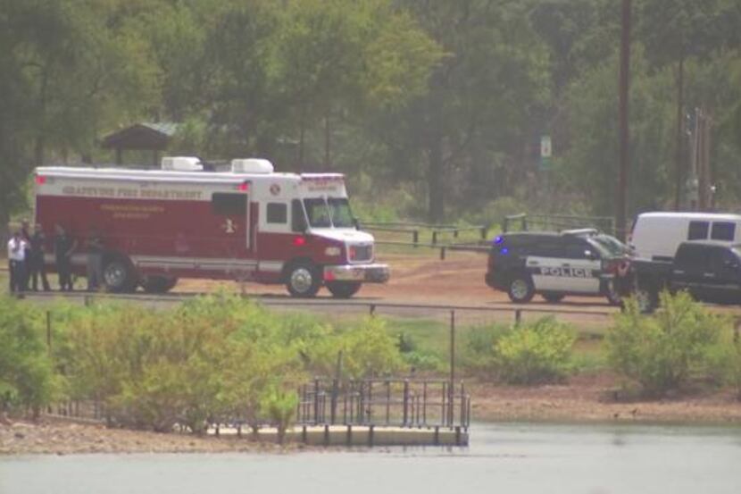 A woman and her son have died at area hospitals after being pulled from Grapevine Lake last...
