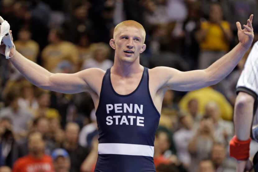 Penn State's Bo Nickal celebrates his victory over Cornell's Gabe Dean in the 184-pound...