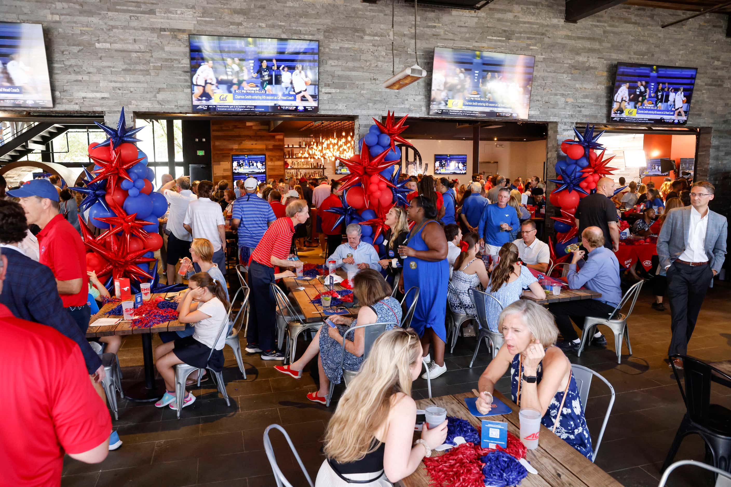 SMU supporters and alumni gather during a celebration of SMU’s first day in the ACC at...