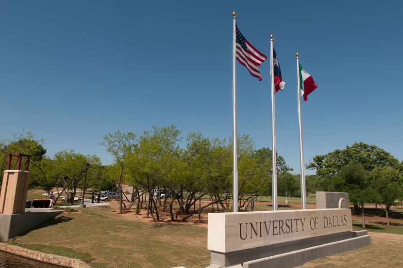A file photo shows a sign at the University of Dallas. A University of Dallas professor...