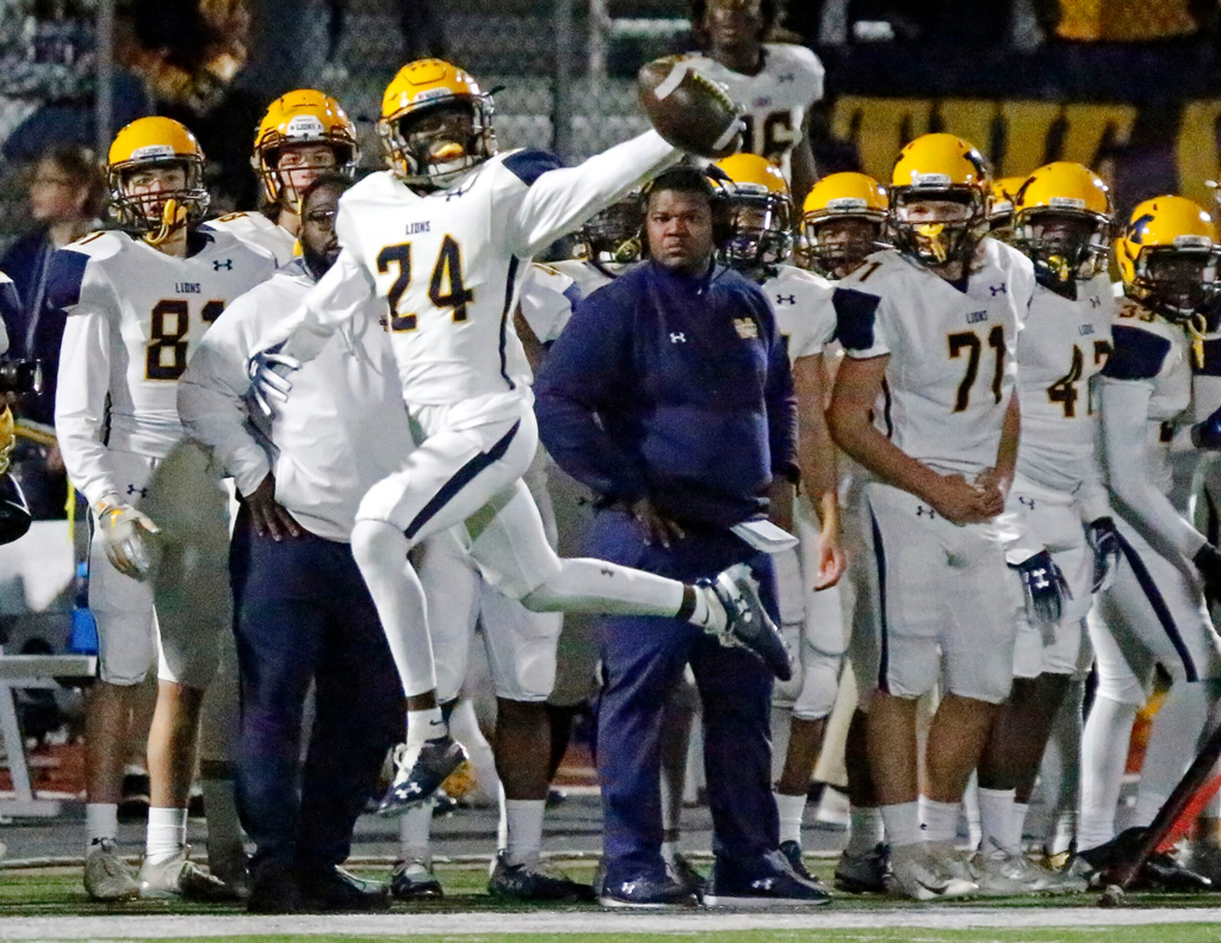 McKinney High Schoolâs Andrew Pitts (24) came close but was unable to stay in bounds with...