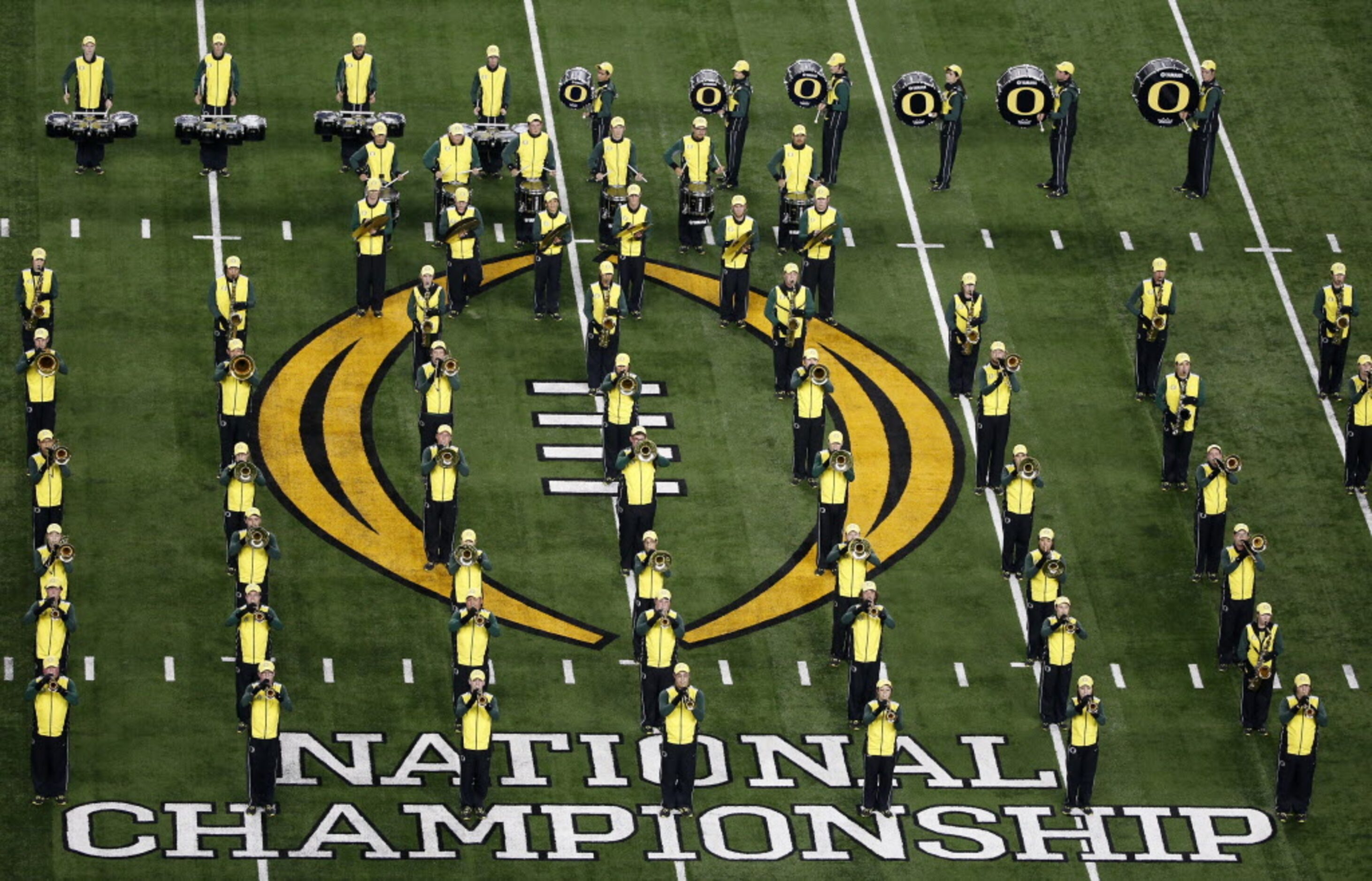 The Oregon Ducks marching band plays during the pre game show before the College Football...