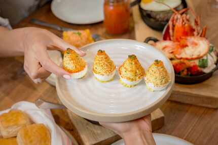 Yardbird Southern Table & Bar, opening in Dallas in 2020, serves deviled eggs on its brunch,...