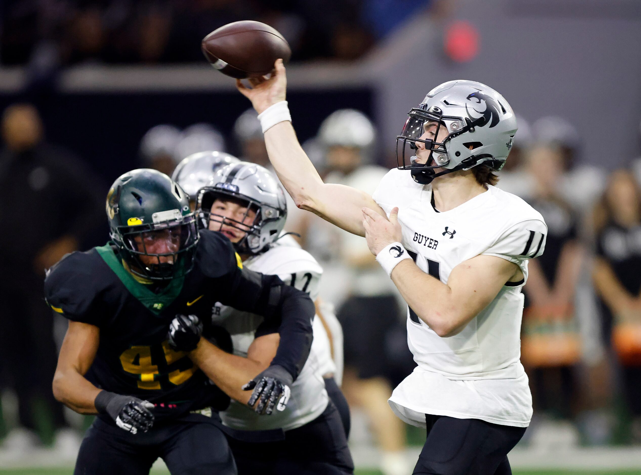 Denton Guyer quarterback Jackson Arnold (11) throws a first half pass against the DeSoto...