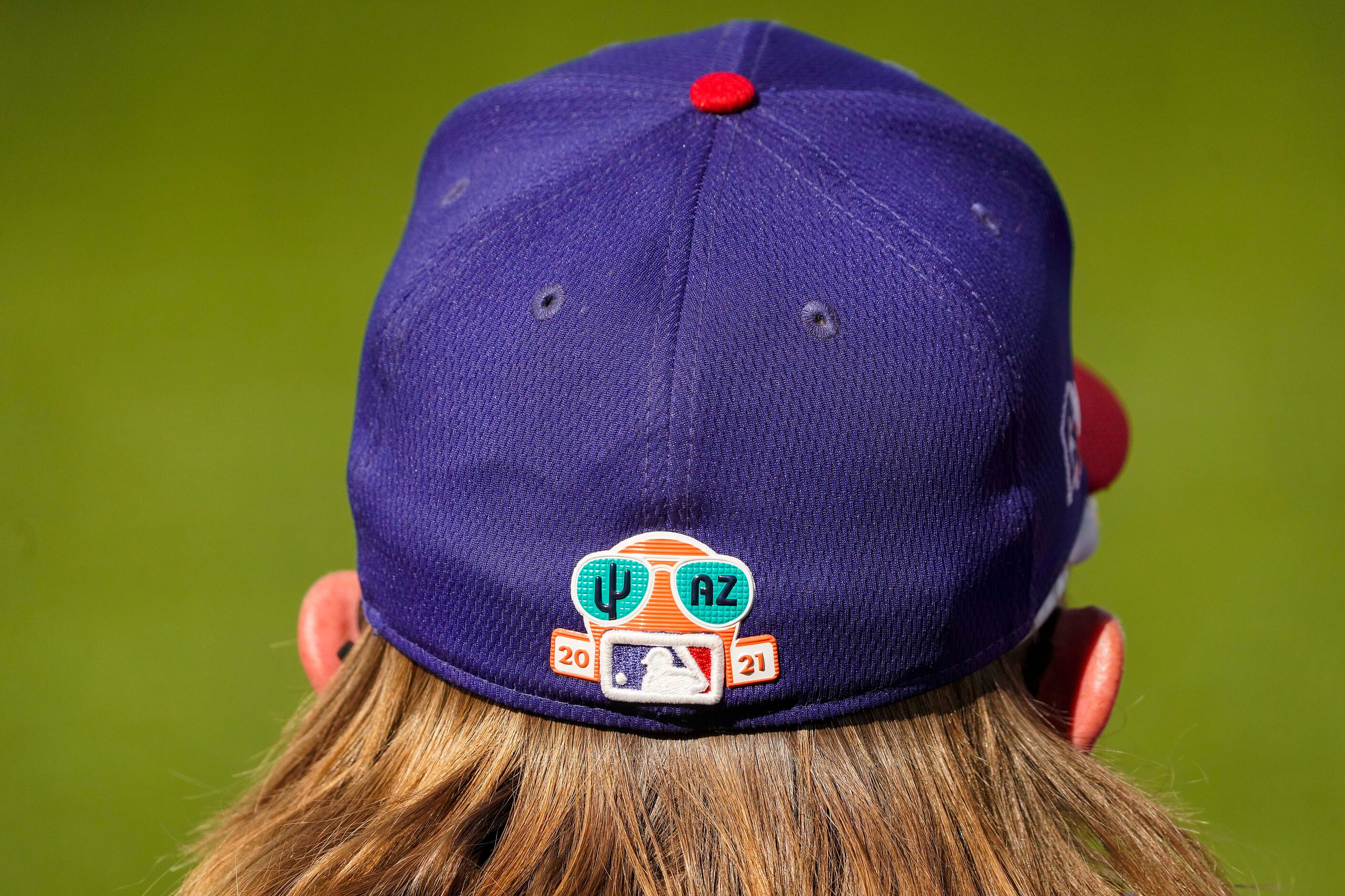 Texas Rangers infielder Davis Wendzel watches from the dugout during the sixth inning of a...