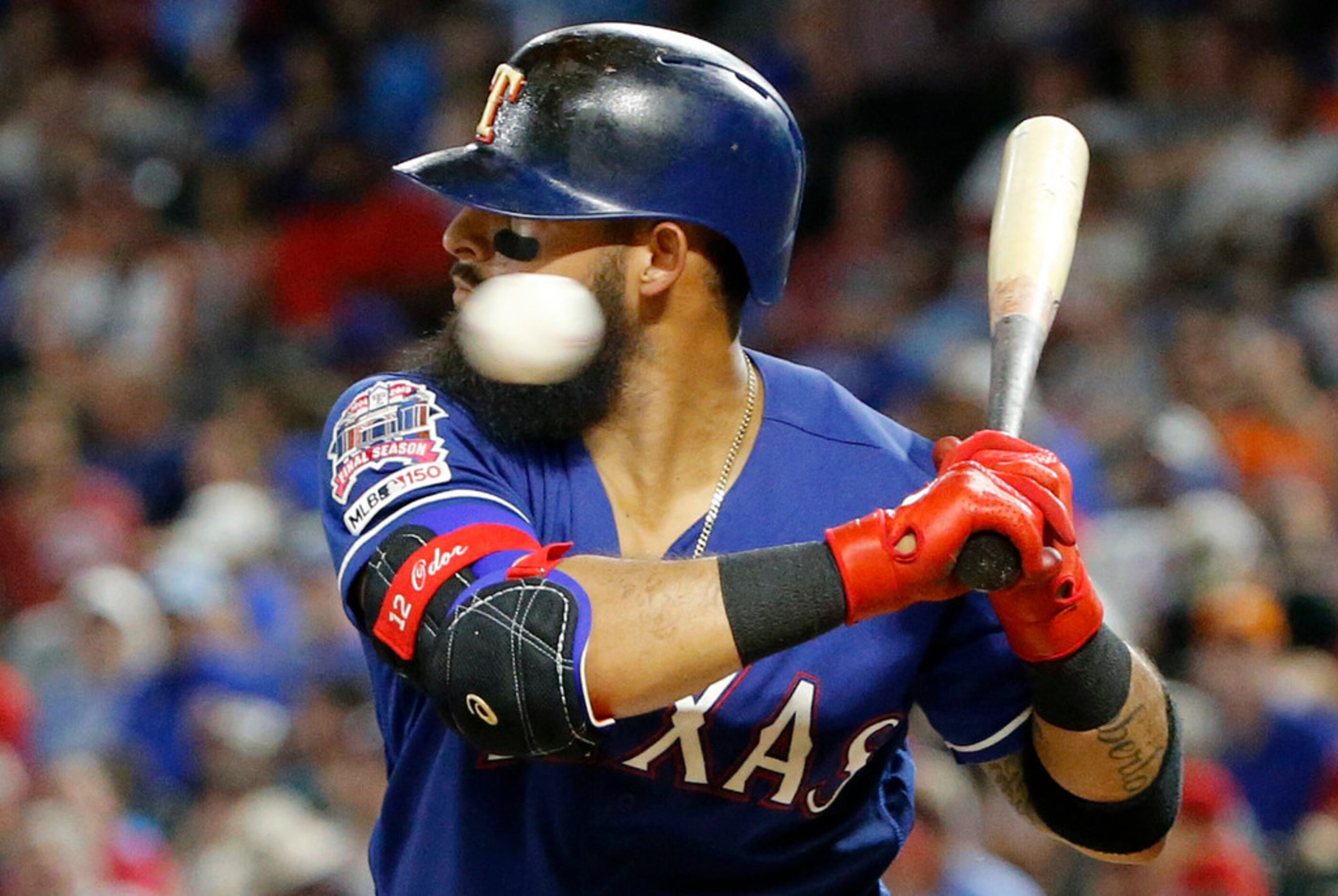 Texas Rangers second baseman Rougned Odor (12) waits on a high fast ball by the Houston...