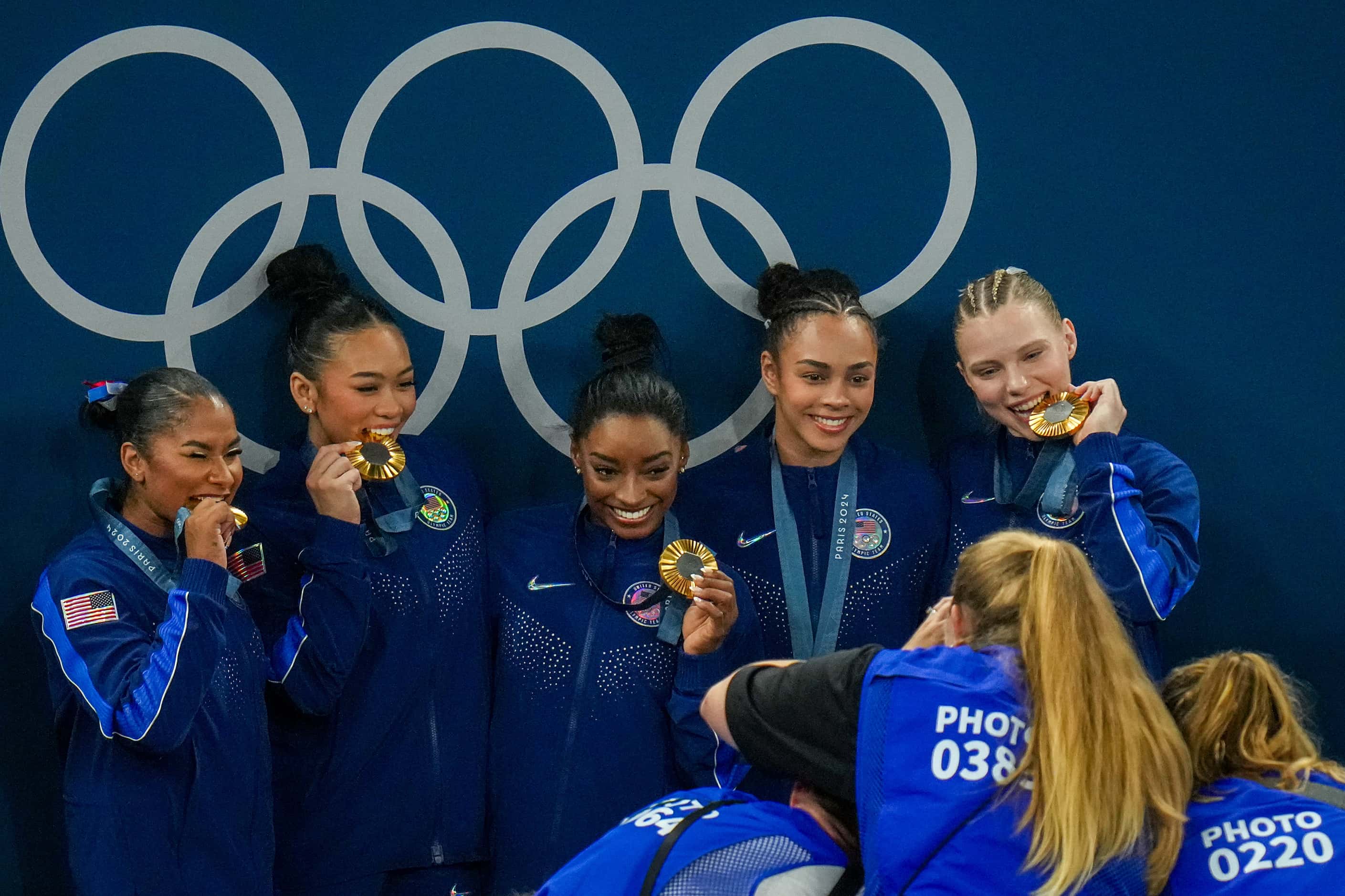From left, Jordan Chiles, Suni Lee, Simone Biles, Hezly Rivera and Jade Carey of the United...