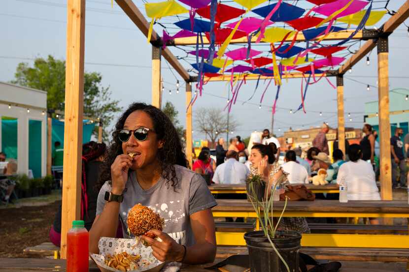 Kristina Byrd enjoyed a Bang Bang Chicken Sandwich from Cat Tail food truck at the launching...