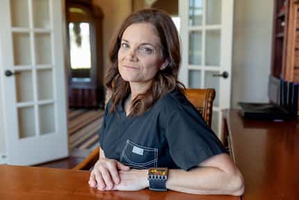 Dr. Laura Anton, pictured at her home, said her soccer coach sexually abused her for years...
