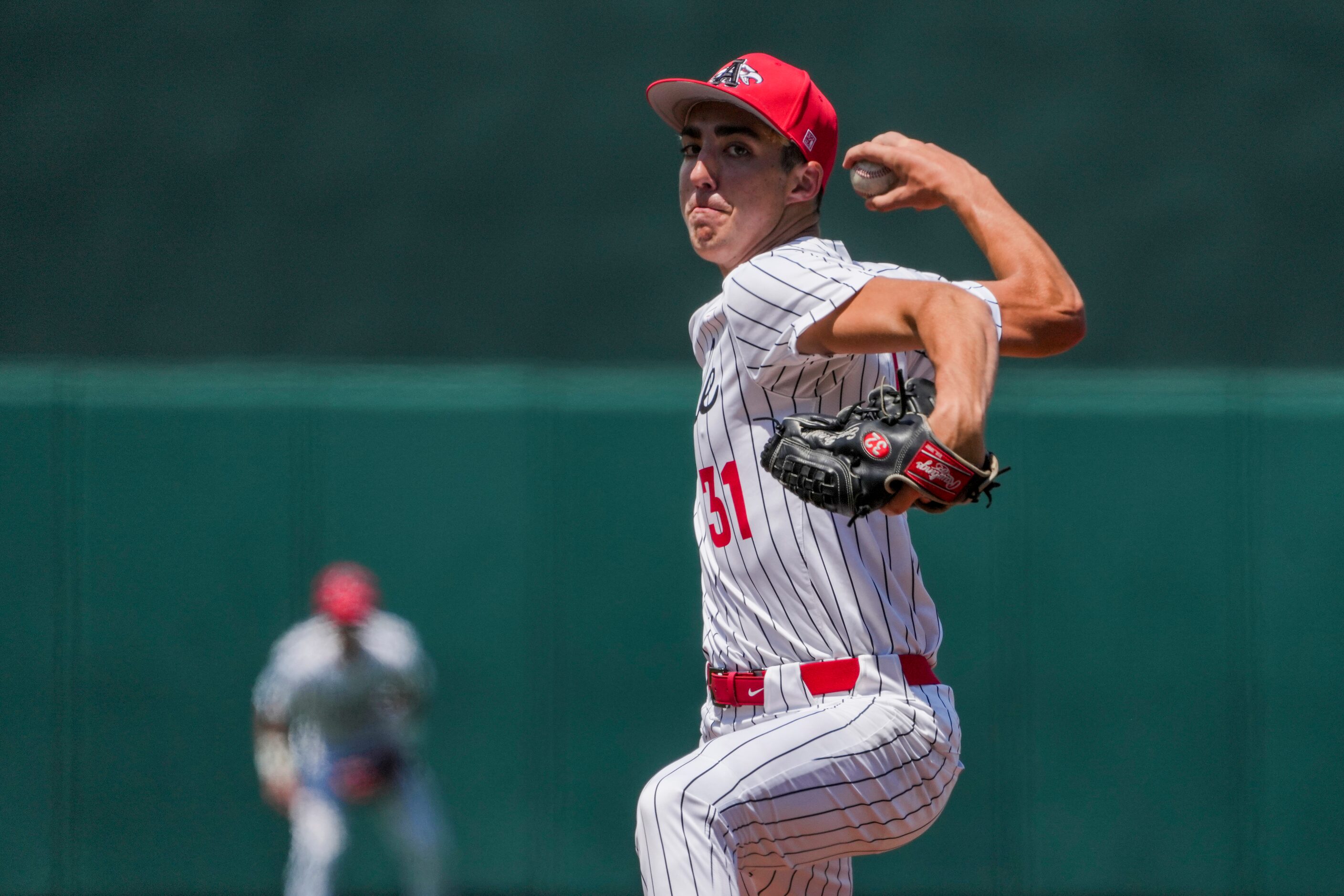 Argyle pitcher Evan Brandt delivers during the seventh inning of a UIL 4A baseball state...