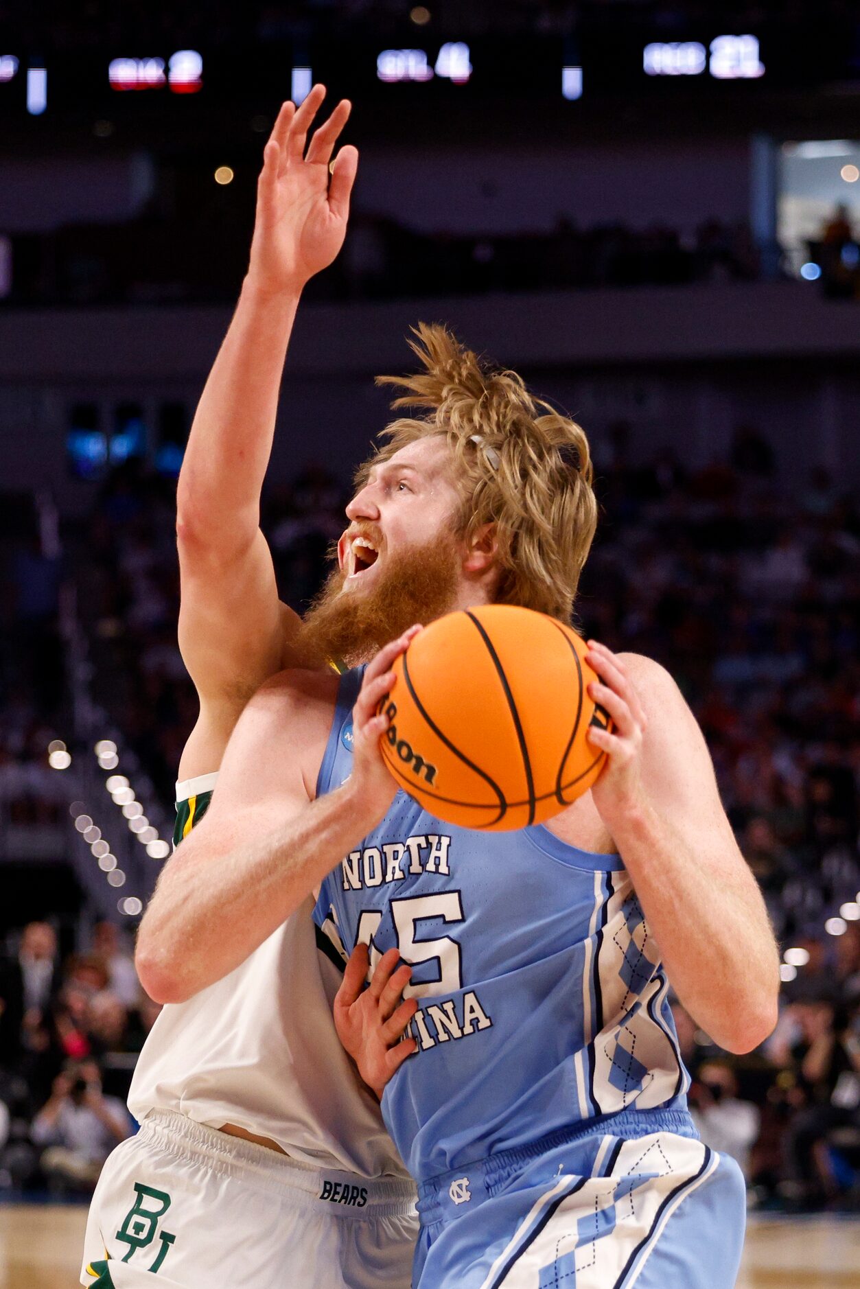 North Carolina Tar Heels forward Brady Manek (45) drives to the basket against Baylor Bears...