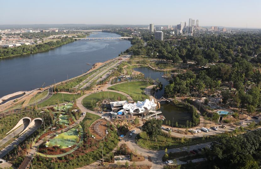 This 2018 aerial photo of Gathering Place, which runs along the Arkansas River, shows the...