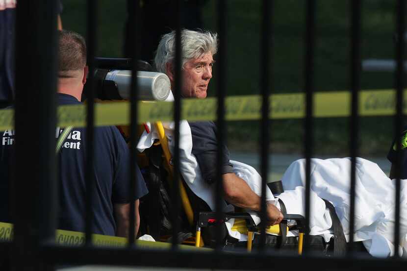 U.S. Rep. Roger Williams (R-TX) is wheeled away by emergency medical service personnel from...