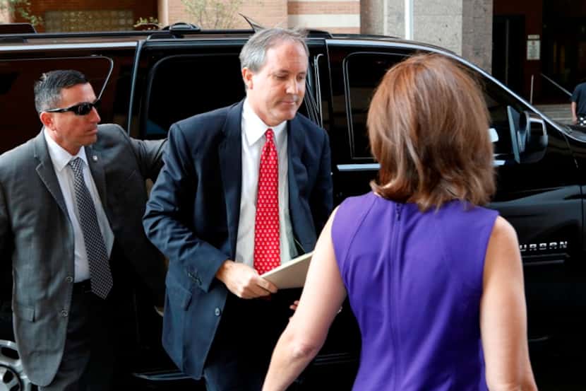  Texas Attorney General Ken Paxton and his wife Angela arrive at the Tim Curry Criminal...