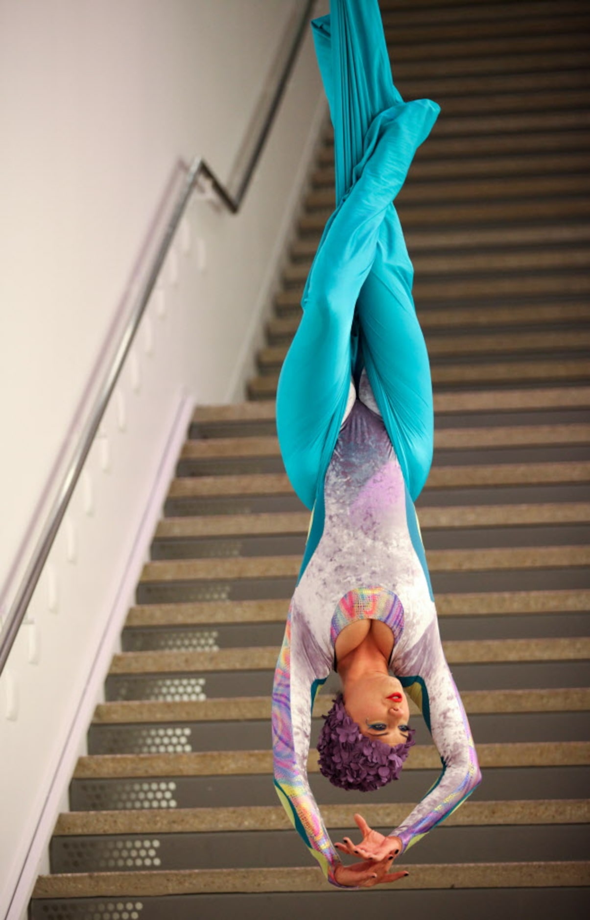 An aerial acrobat performs during the Pre-Party for the "Night at the Museum 2012" event at...